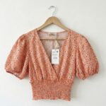 חולצת קרופ פרחונית Pull & Bear - פול אנד בר יד שנייה בנמיז - Nemyz